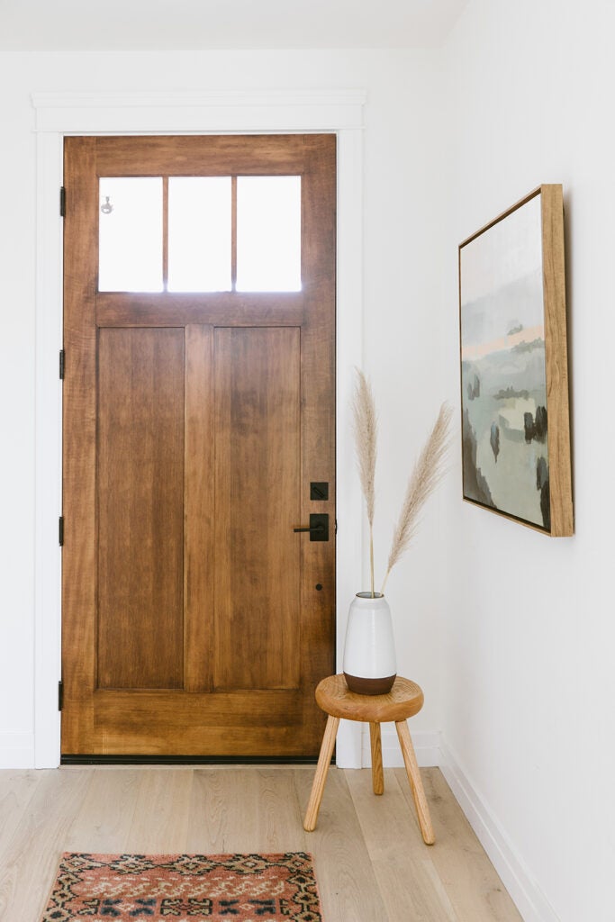 entry way with wooden stool