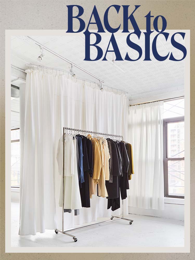 the break retail shop white curtains hung from ceiling in front of clothing rack