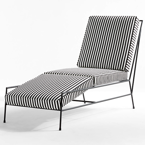 Striped cushions on metal lounge chair frame by CB2