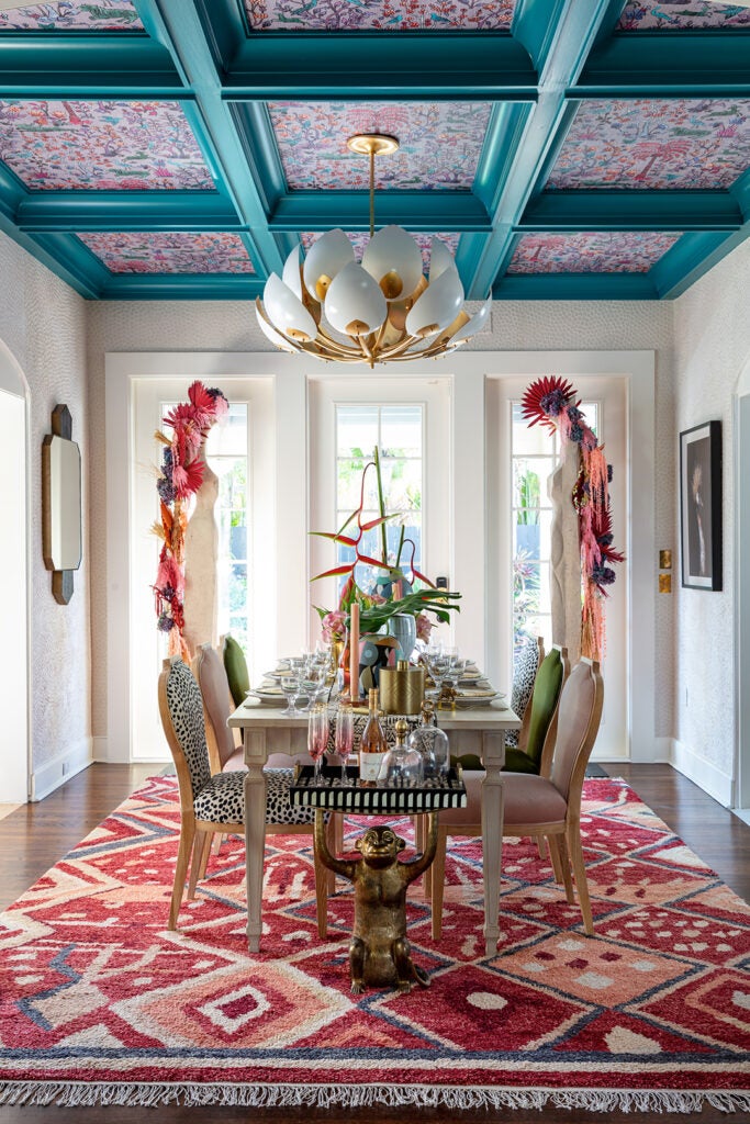 dining room with blue coffered ceiling