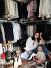 woman in closet with baby