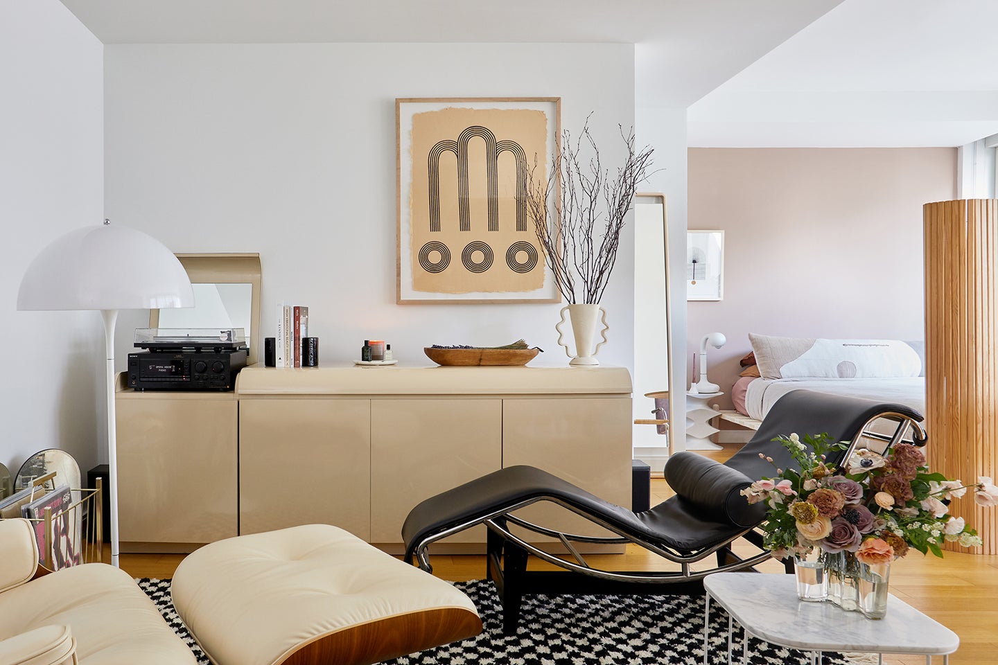 Small Living Room with Credenza and Record Player and Two Lounge Chairs