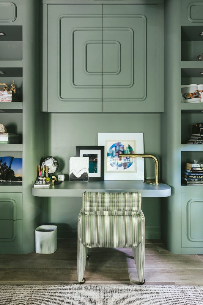 A Curvy Spin on Picture Frame Molding Takes the Formality Out of This Sage Green Office