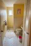 dated yellow bathroom