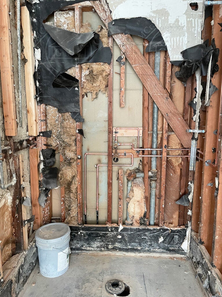 bathroom walls ripped open