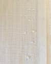 fabric glue on edge of white curtain