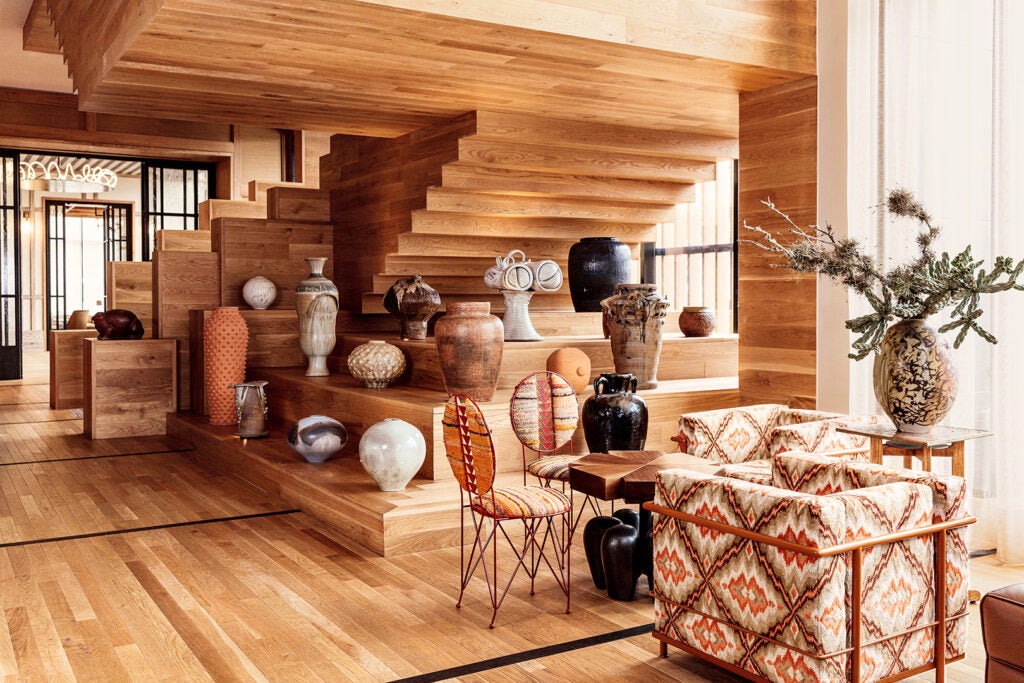 stairs covered in ceramic pots and vases