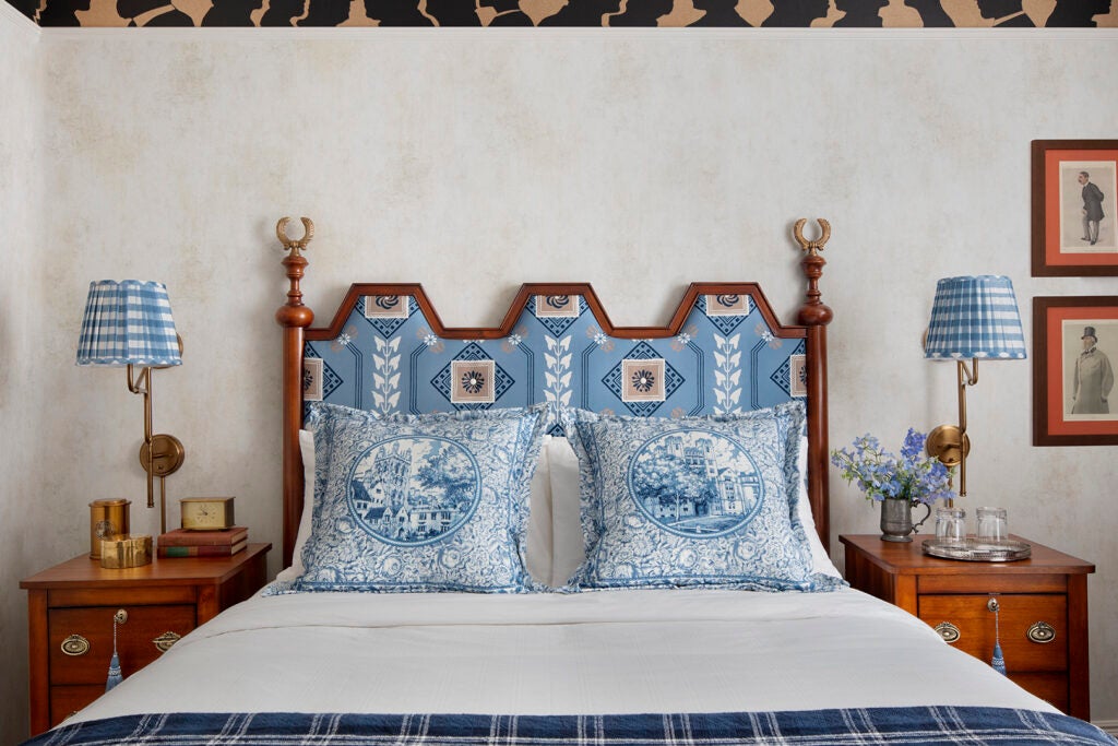 shot of bed with geometric headboard