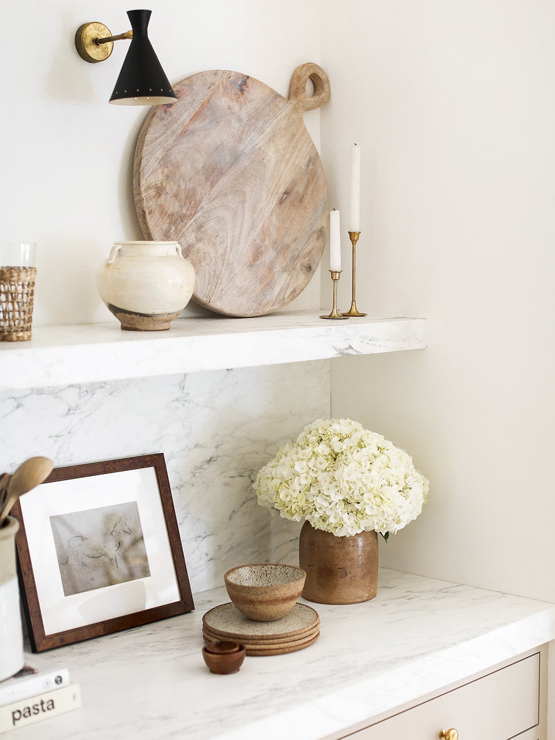 marble countertop with floating marble shelf