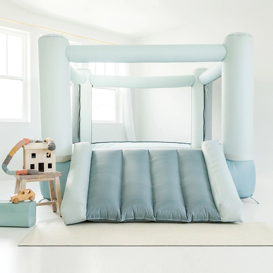 powder blue bounce house with slide