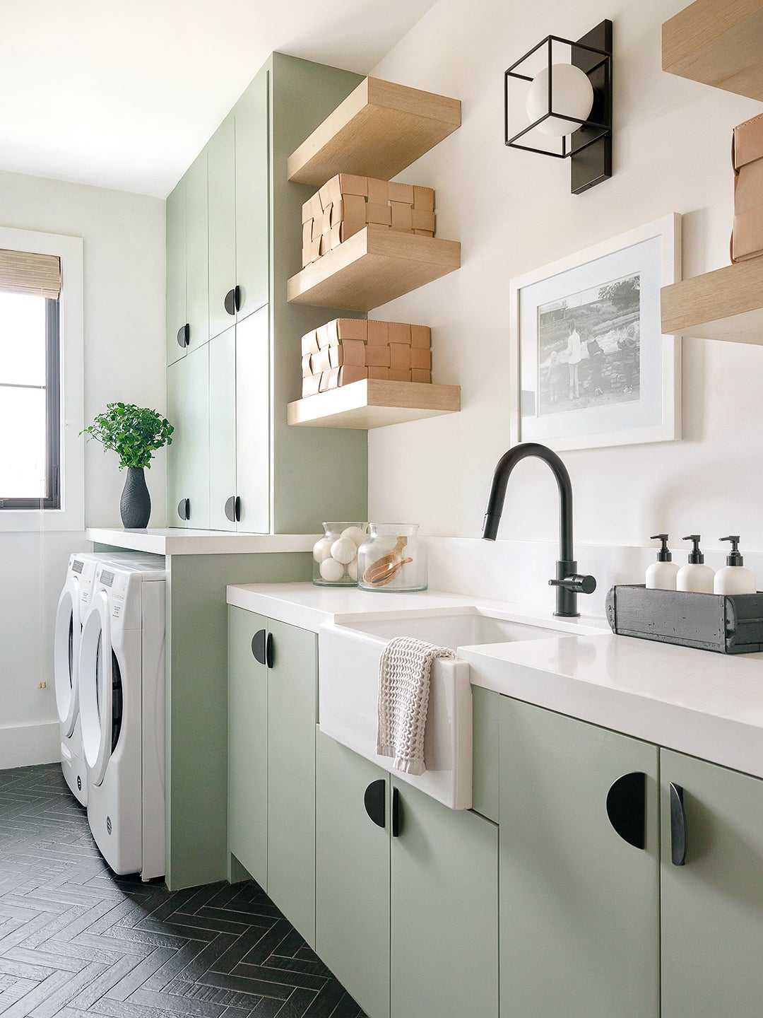 This Minimalist Homeowner Found a Middle Ground Between Gray and Green for Her Laundry Room Cabinets