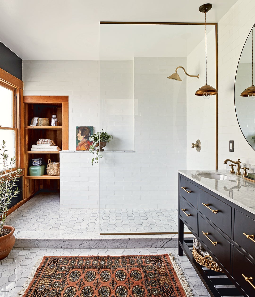 bathroom with marble floors and black vanity