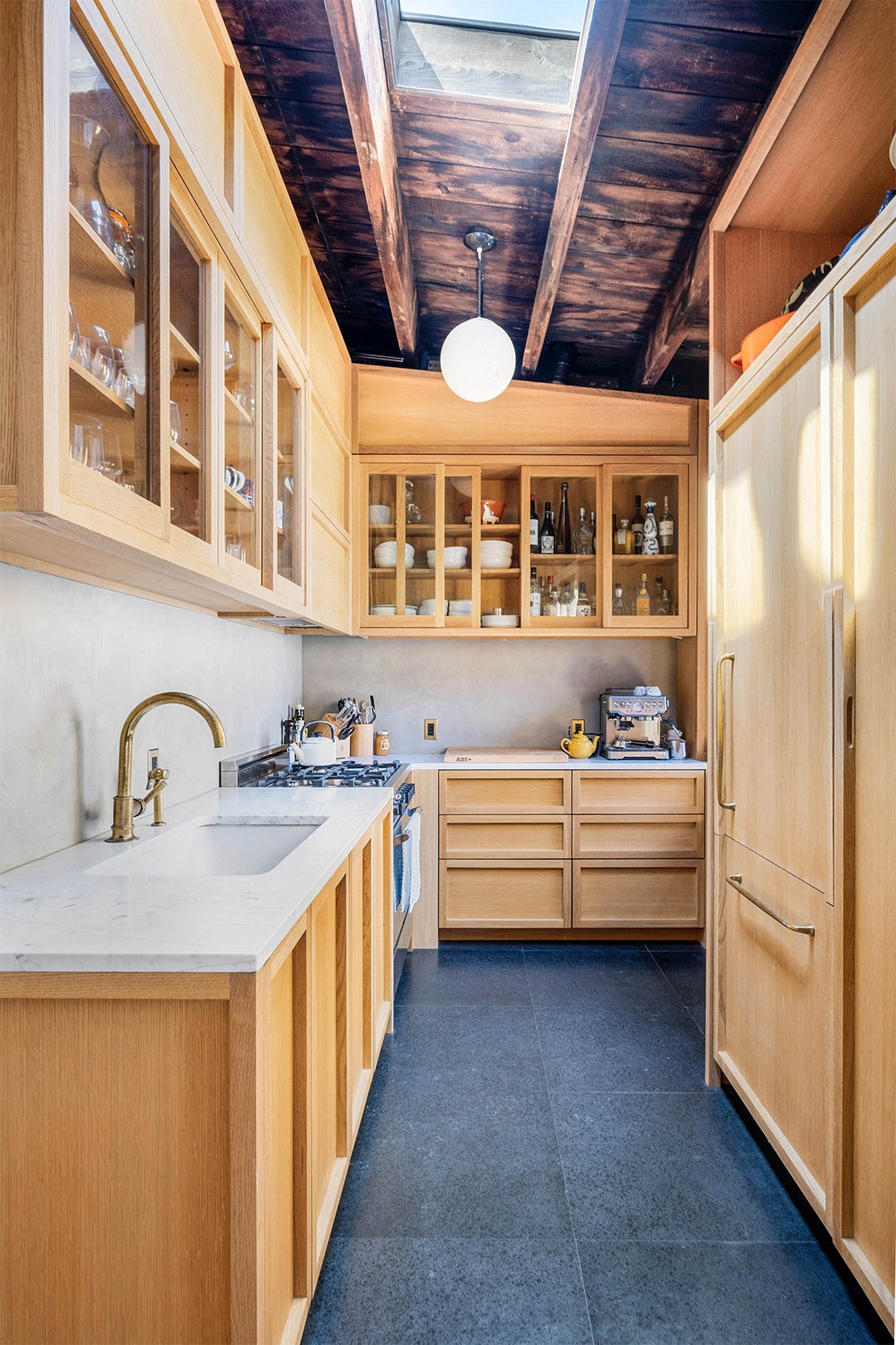Actor Alexander Skarsgård’s Galley Kitchen Doesn’t Feel Small Thanks to This Cabinet Style