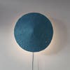 round blue paper mache sconce with cord