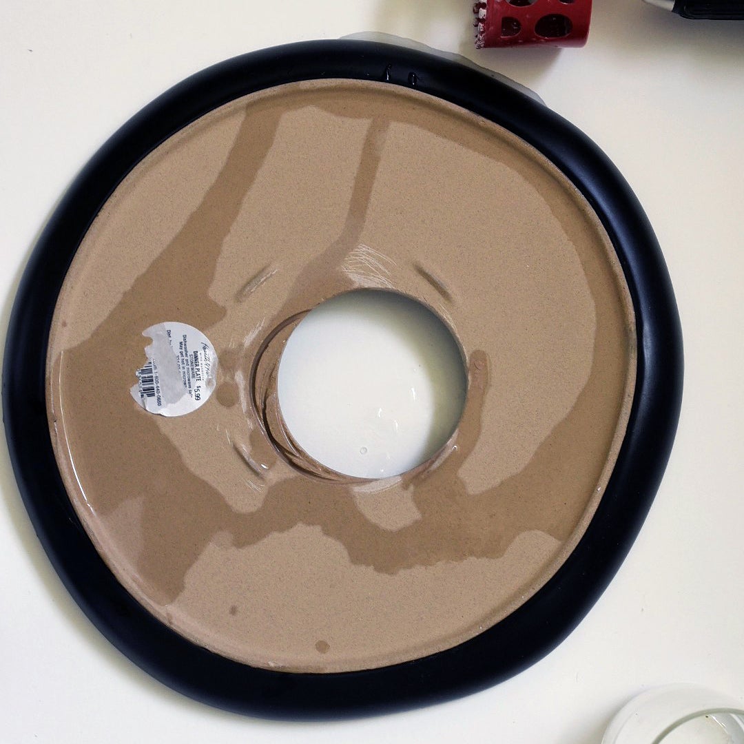 ceramic plate with a hole cut out