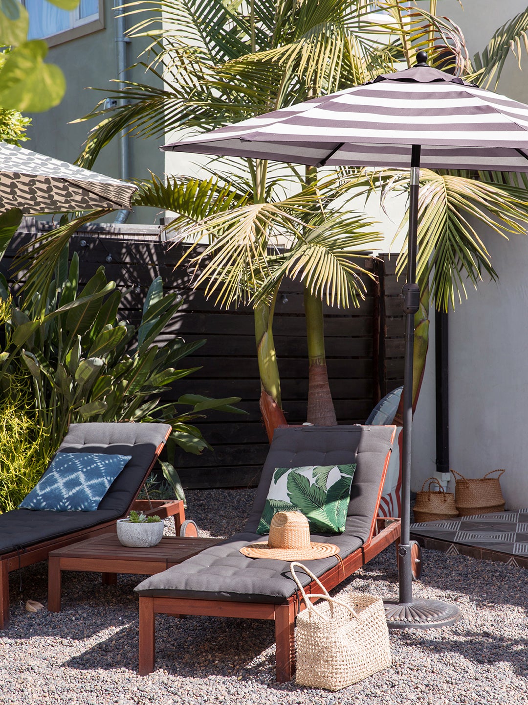 outdoor space with striped umbrella