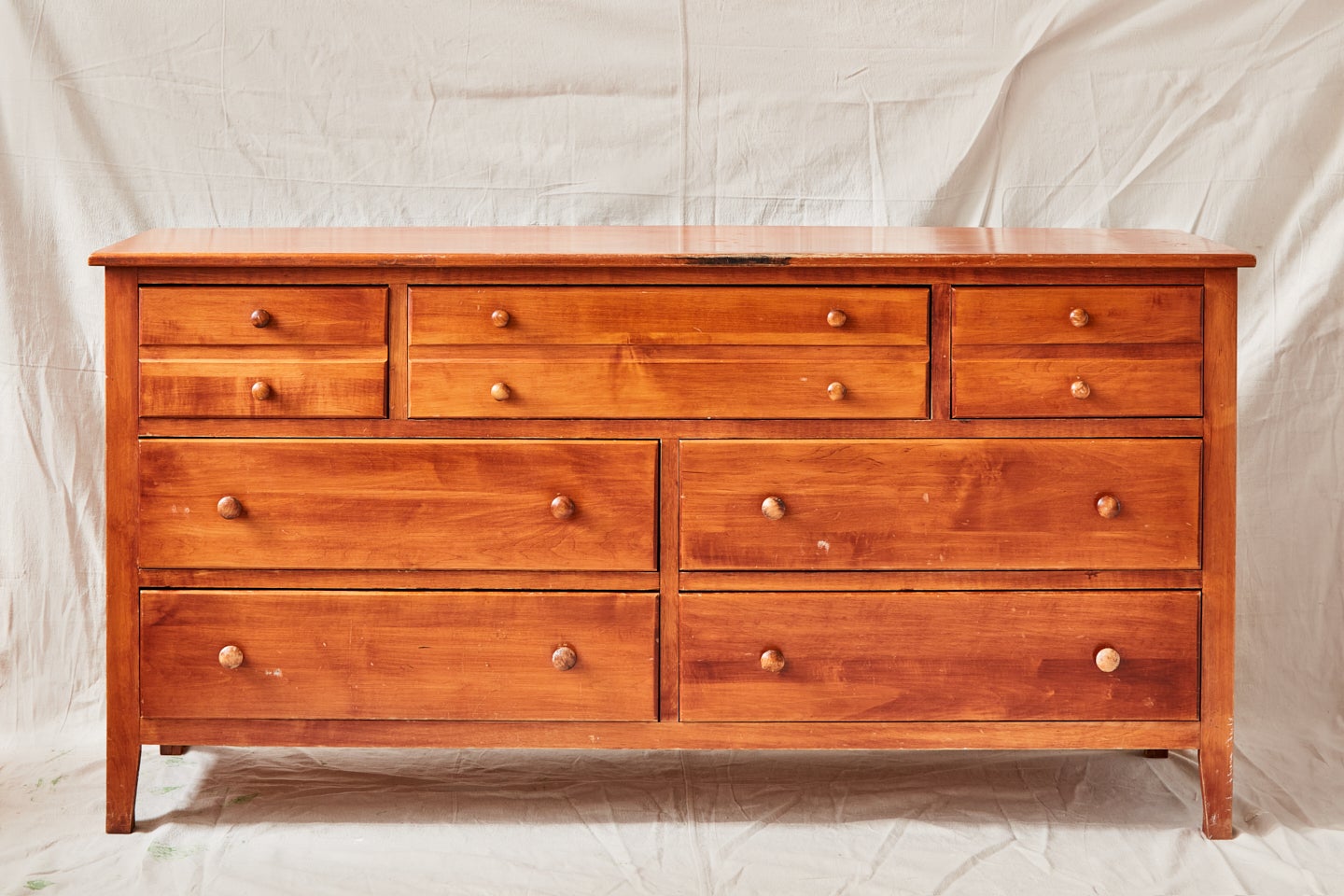 wooden dresser with drawers