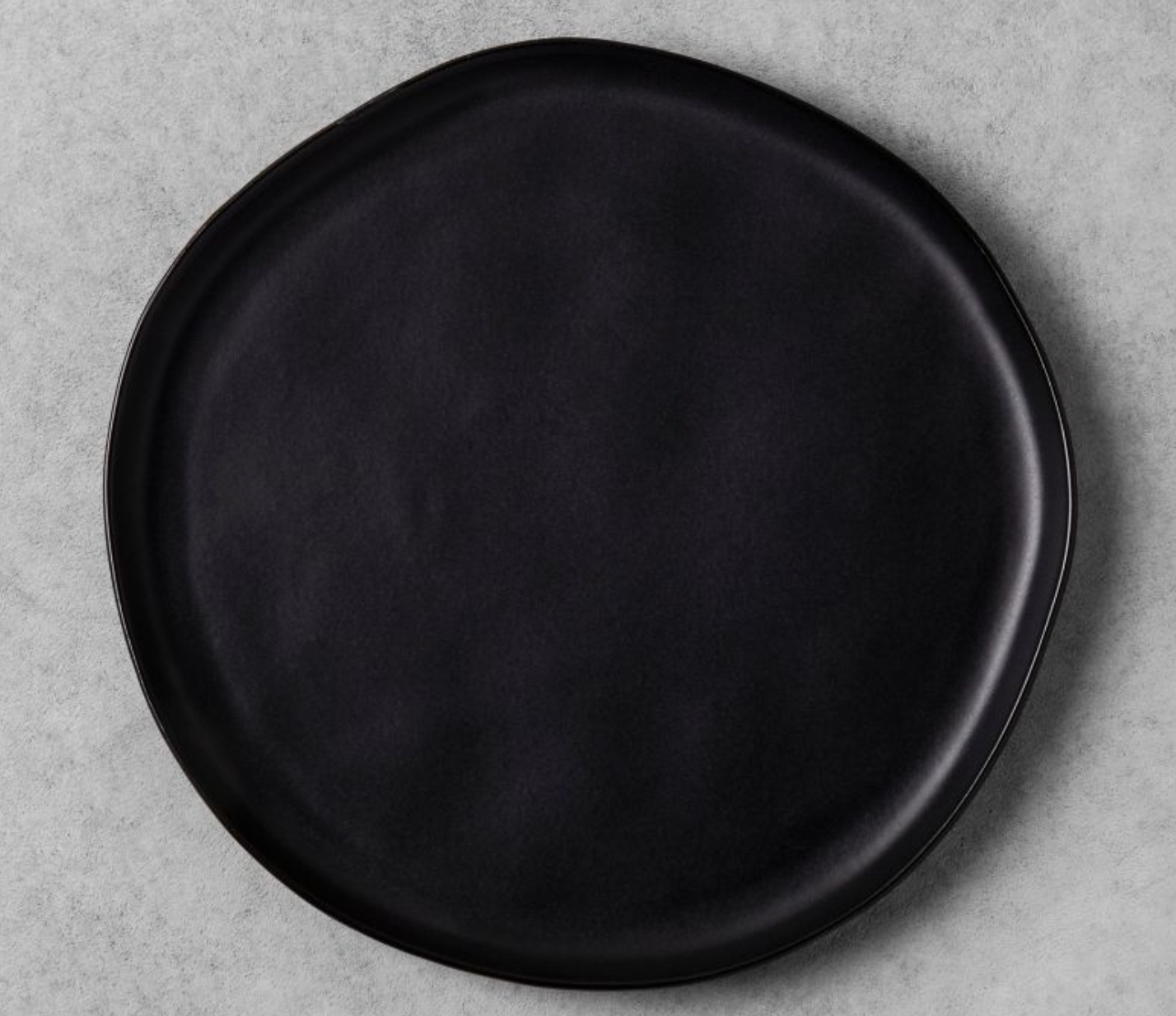 black ceramic dinner plate