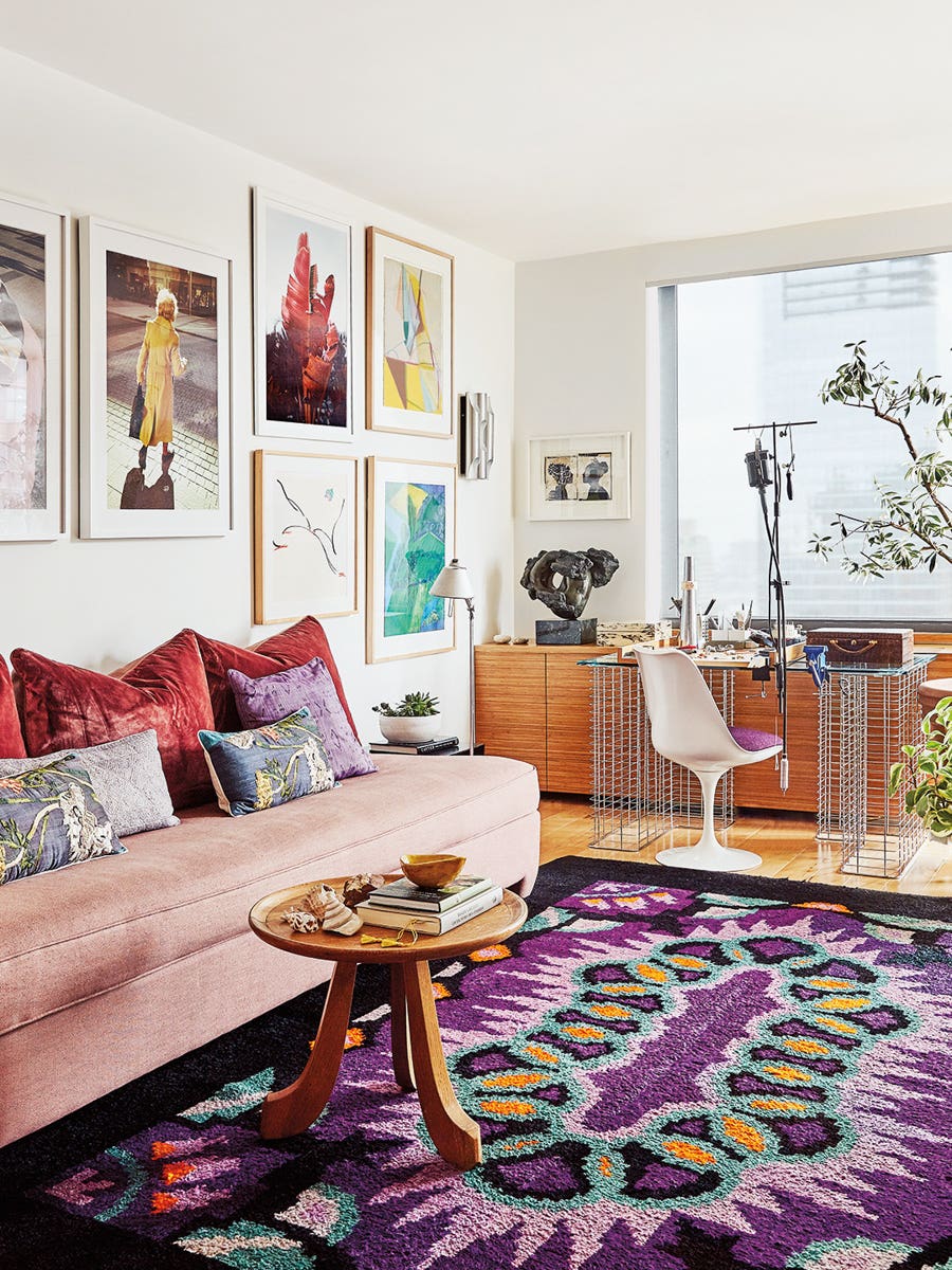 Living Room with Pink Couch and Purple Rug