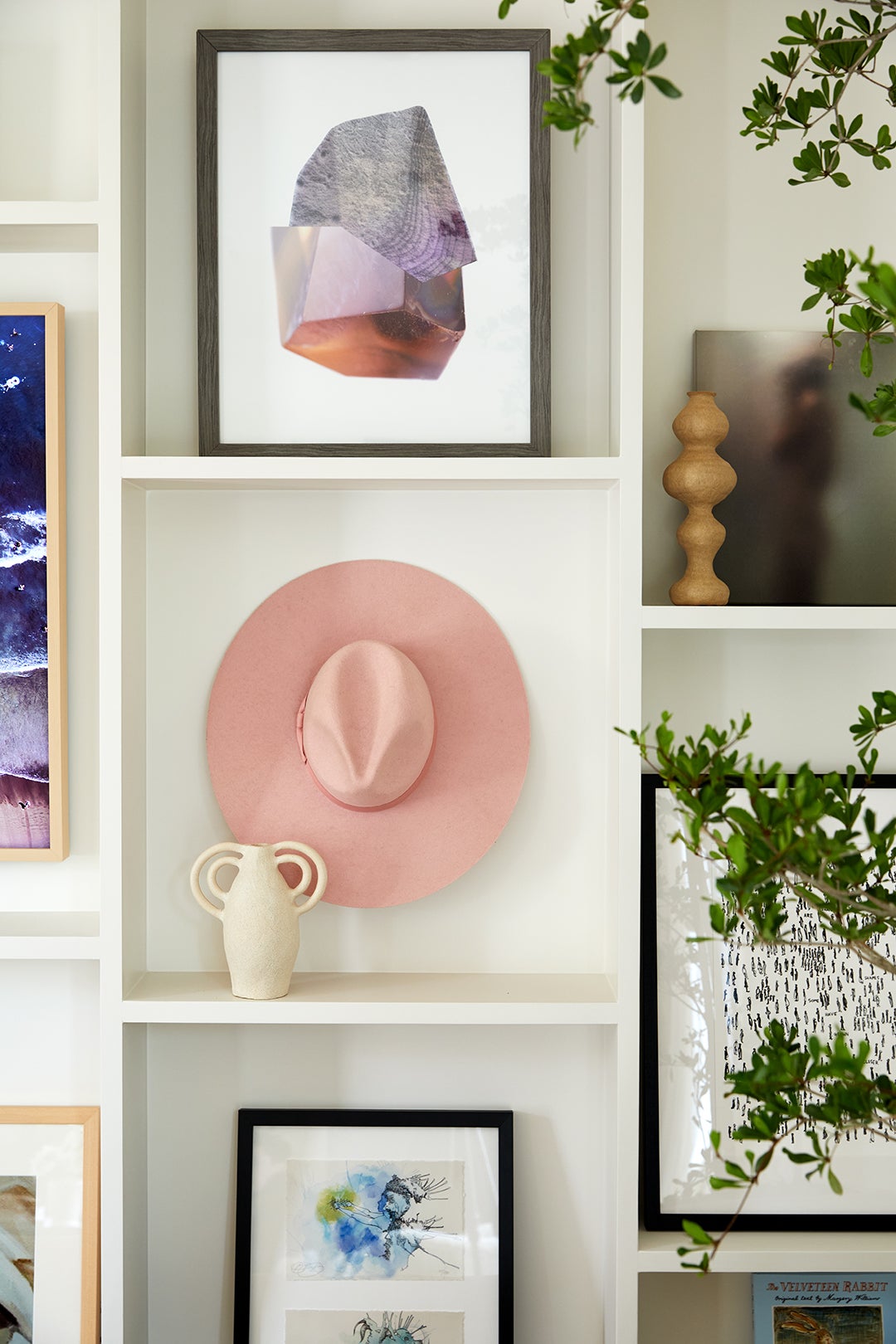 pink hat in gallery wall