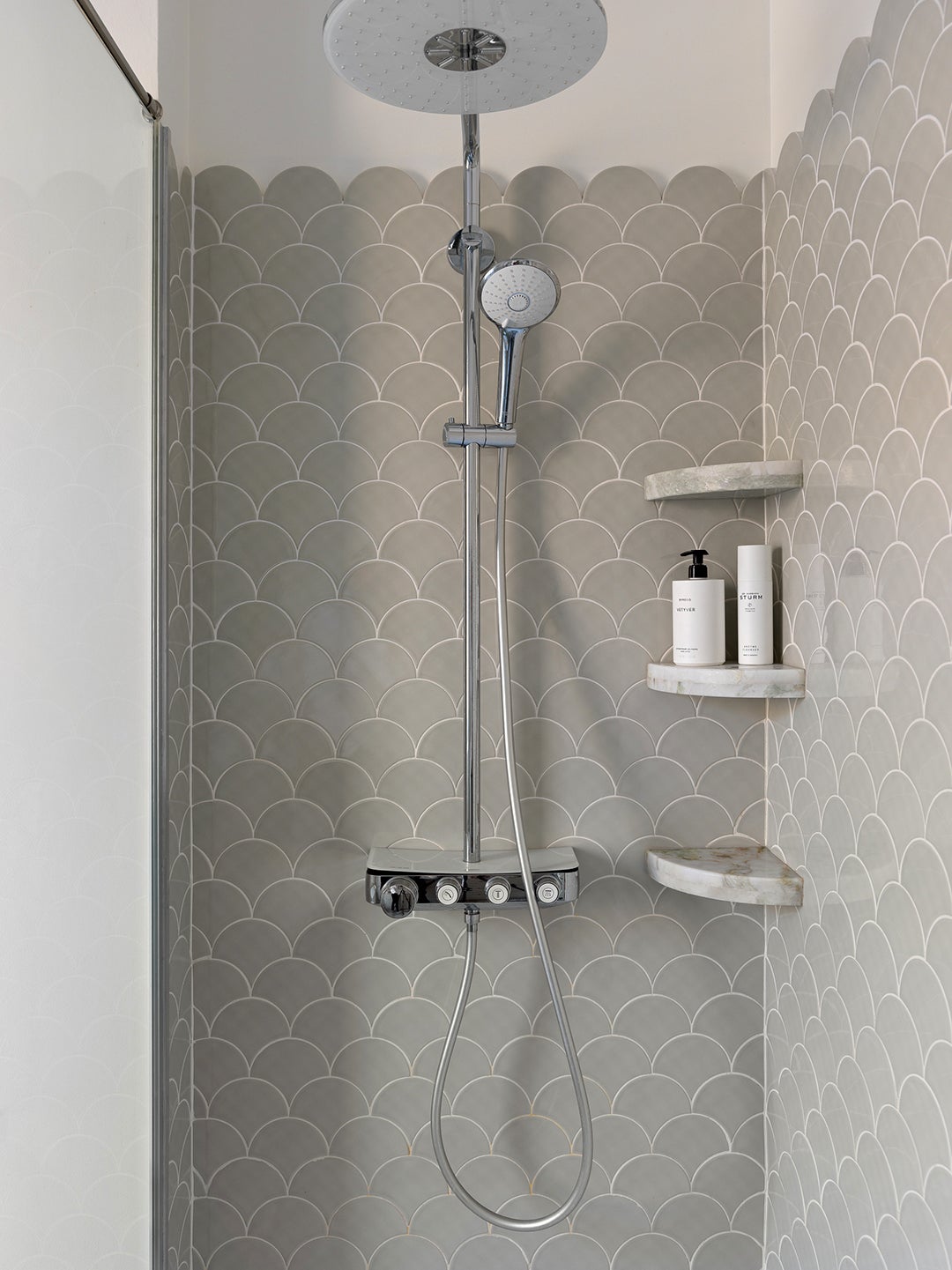 gray scalloped shower tile