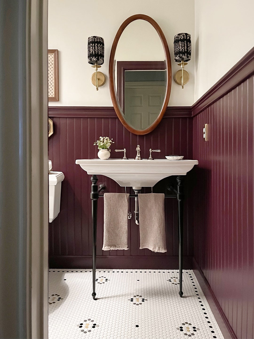 eggplant bathroom with console sink