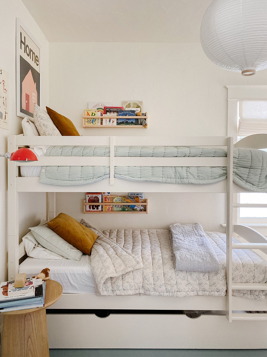 white bunk bedbeds with blue quilts