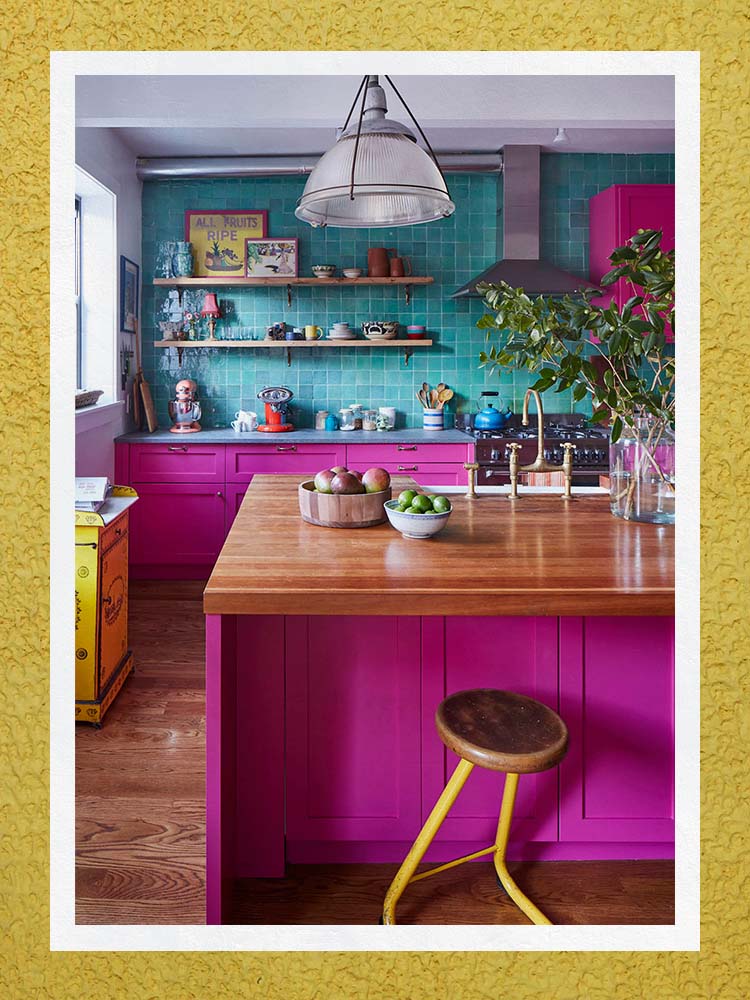 Kitchen with pink cabinets