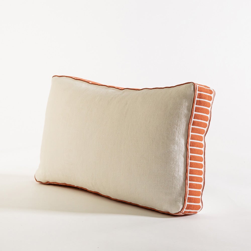 cream and orange throw pillow