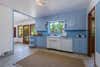 a dated blue kitchen