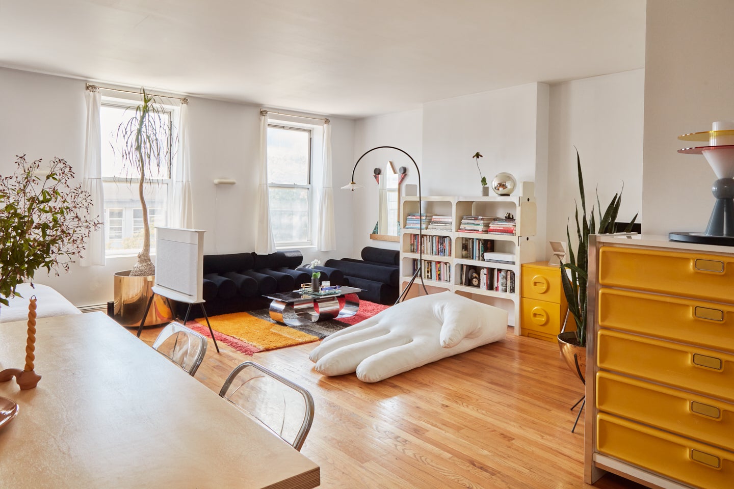 Studio apartment with giant hand pillow