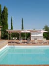 Villa Lena Tuscany pool deck with red brick