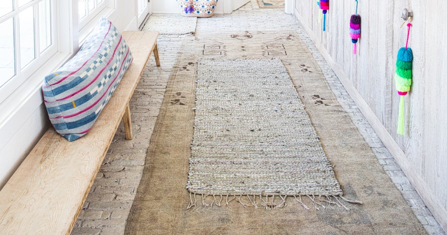 7 Ways to Layer Rugs on Carpet That Will Cost Less Than Replacing Your  Whole Floor