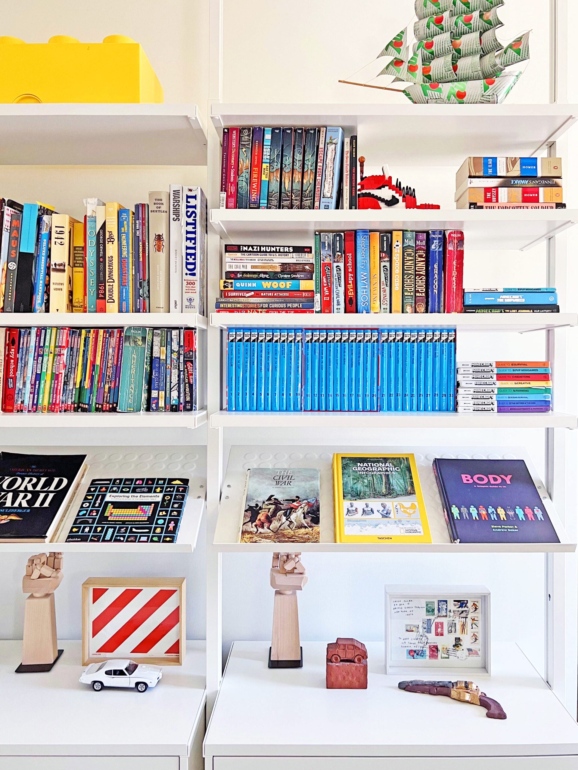 slanted Ikea show shelves displaying books