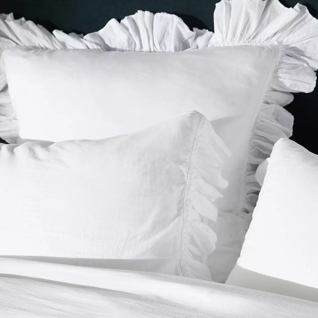 white ruffle sheets