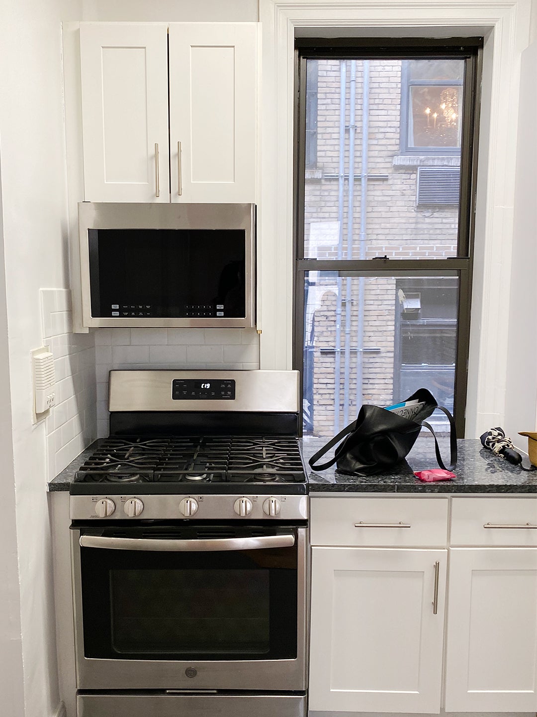 In This Small NYC Kitchen, Even the Window Frame Doubles as a Storage Spot