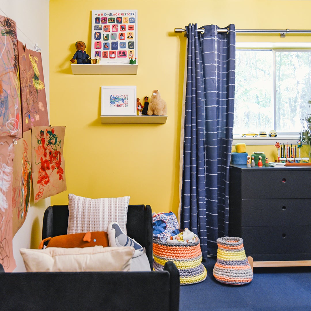 yellow kids room accent wall