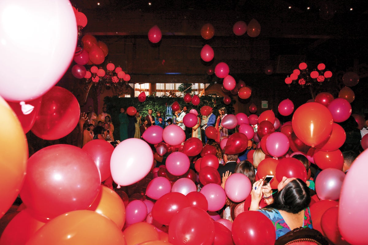 pink balloons falling