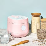 pink rice cooker on countertop