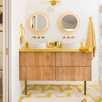 retro yellow bathroom with patterned floor tile