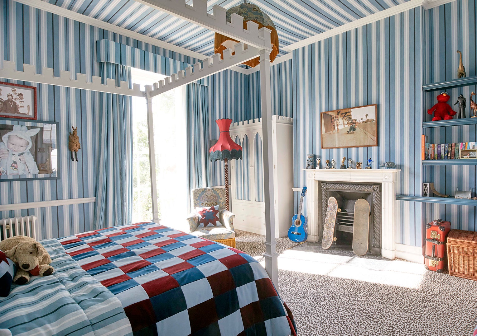 Children's room with blue striped walls.
