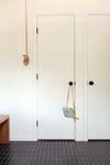 closet dor next to pulley system