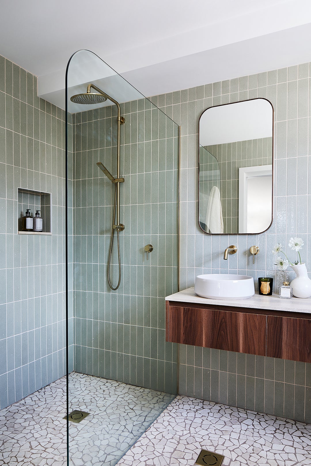 shower with green tile