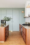 wood and green kitchen cabinets