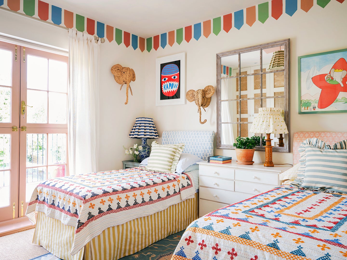 circus-themed kids room with painted multicolored trim