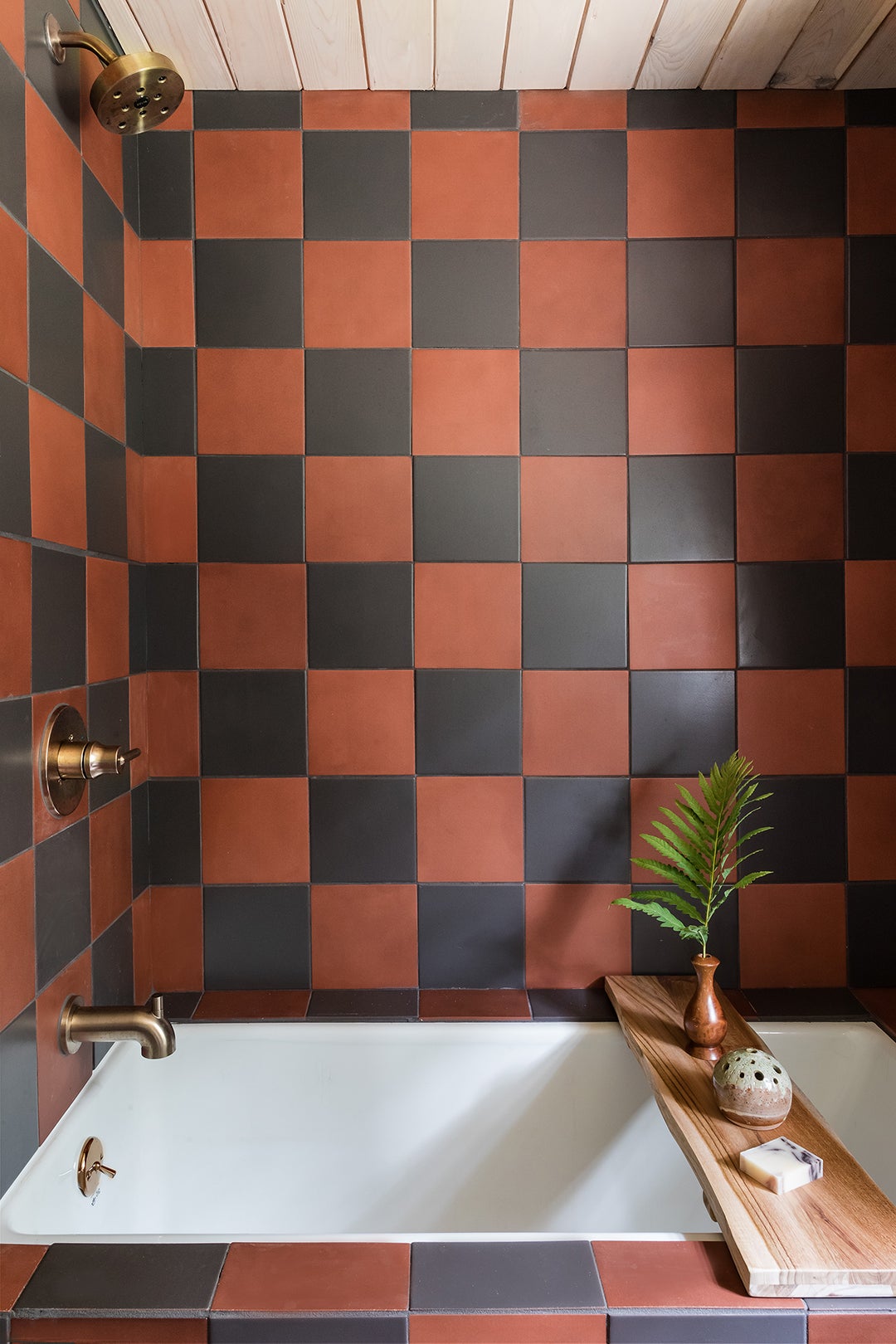 red and black tiled shower