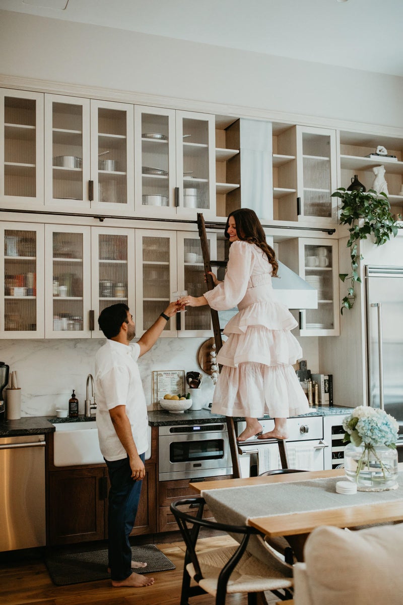 couple in kitchen.