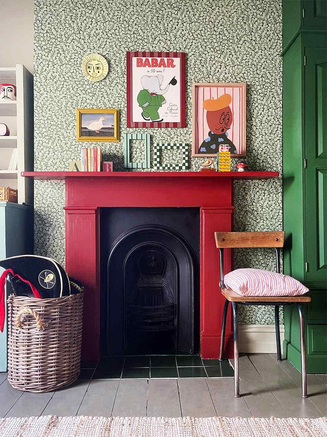 red mantel against green jungle wallpaper