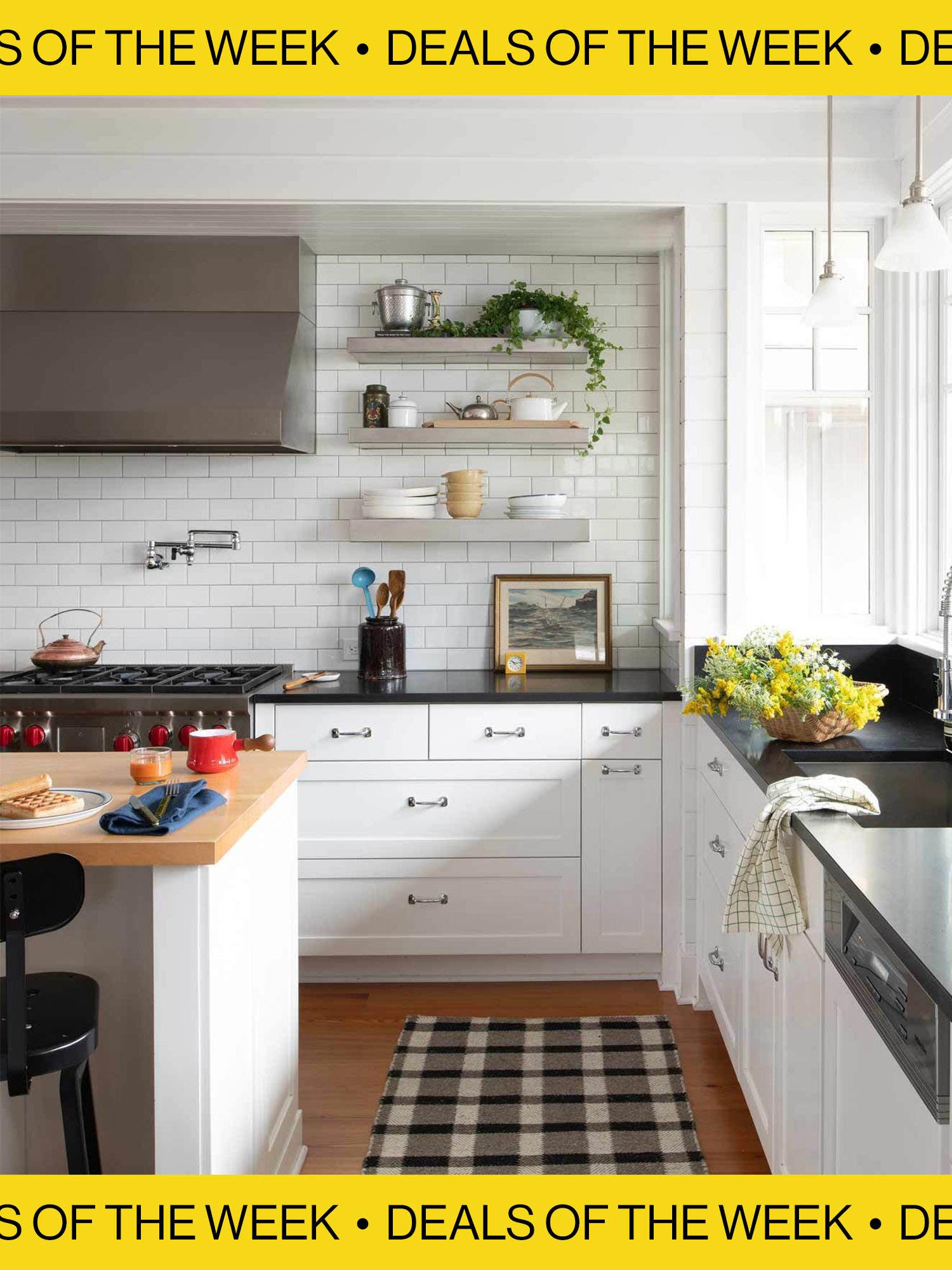 Schoolhouse white kitchen with plaid rug in front of the sink