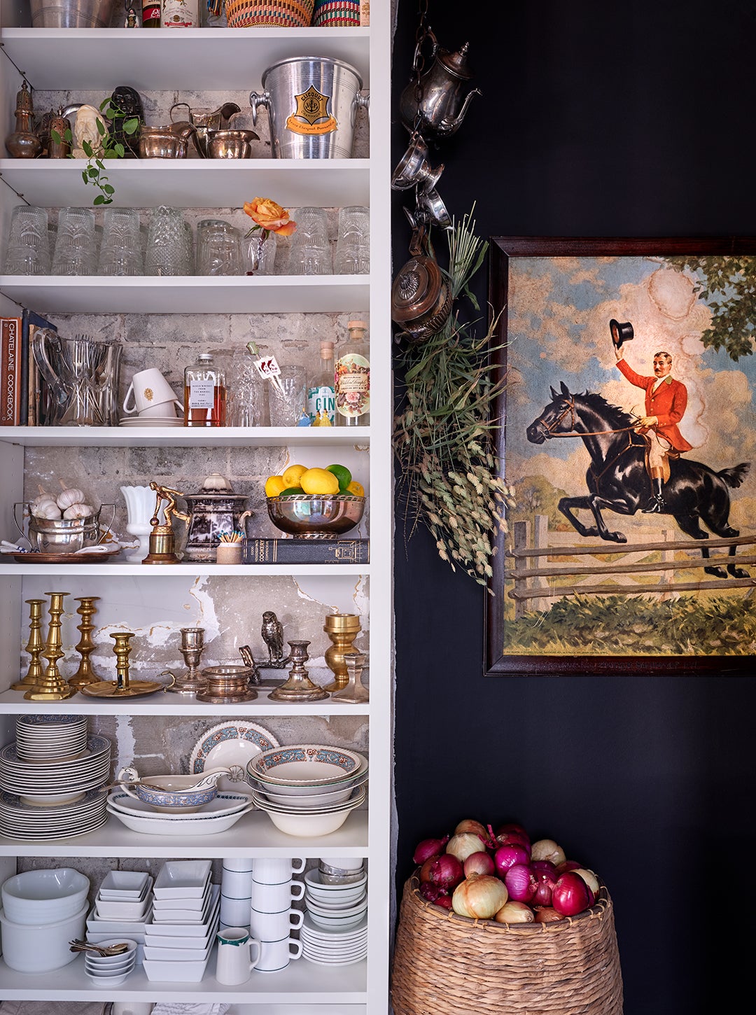 shelves stocked with vintage dishes